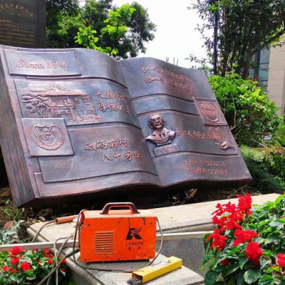 銅雕書，學(xué)校校園景觀雕塑
